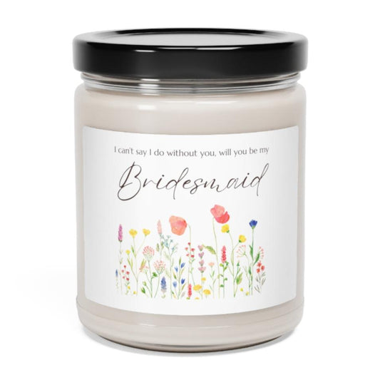 A picture of a glass jar of our lit soy candle that says: I cant say I do without you, will you be my Bridesmaid. There is a lovely painted style wild flower graphic underneath the sayings.